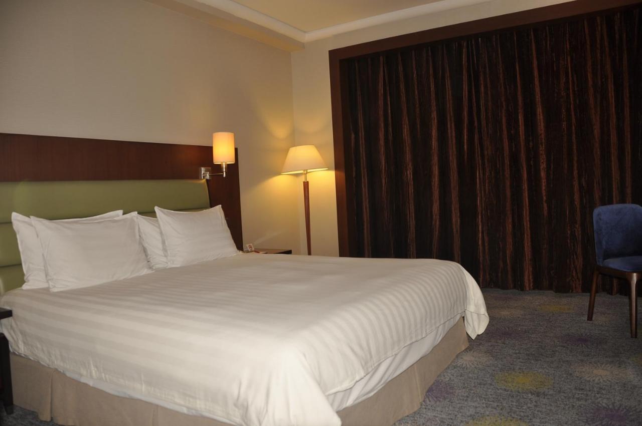 Ramada Plaza Pudong Hotel 4*
